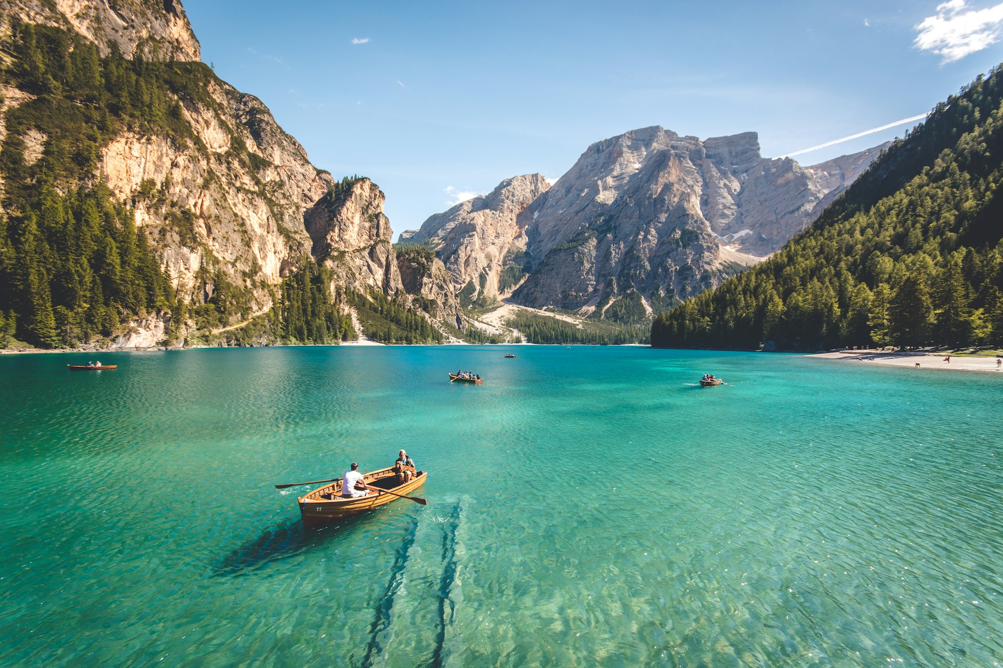 Still alpine water under a long sky